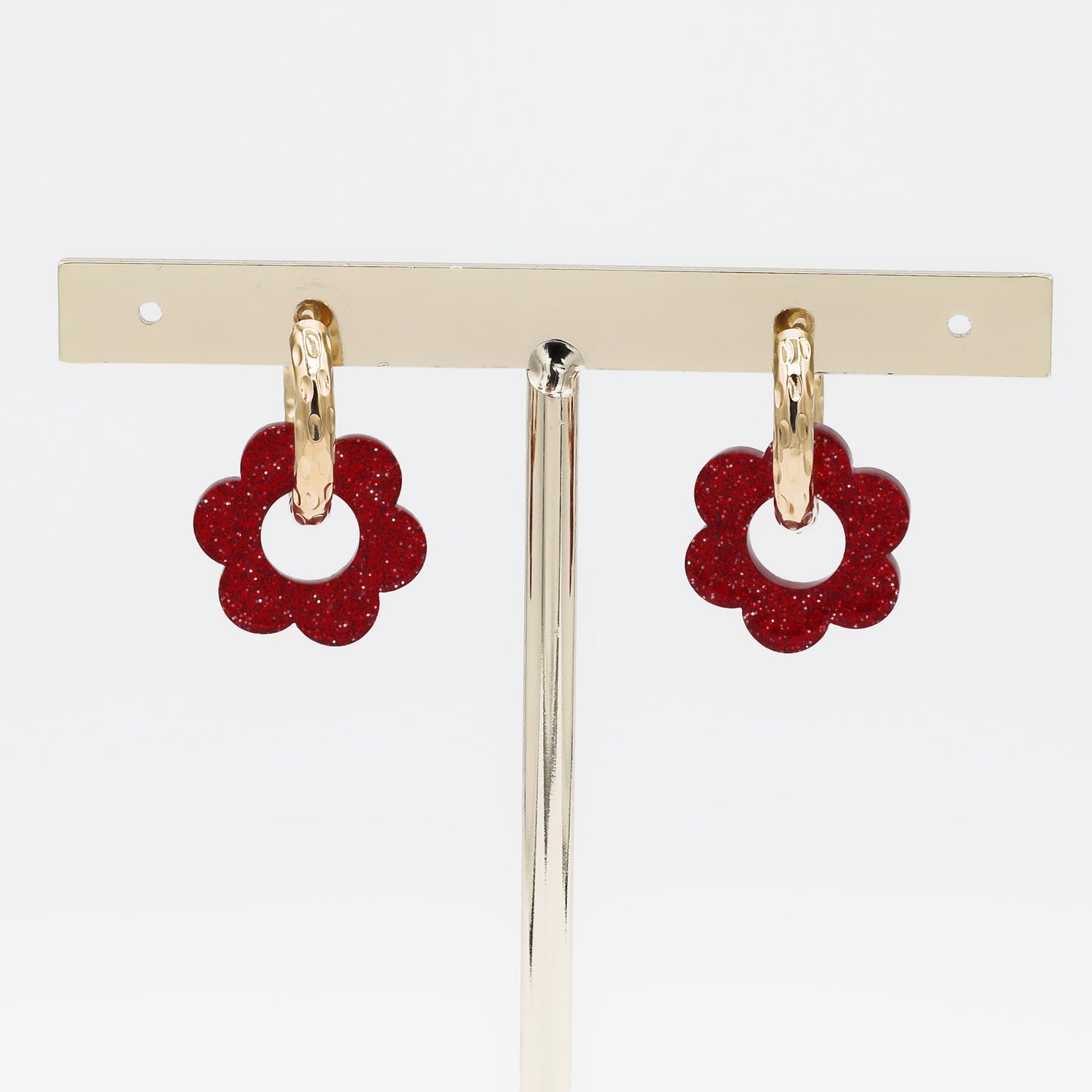 Créoles rondes effet martelé avec fleur transparente à paillettes