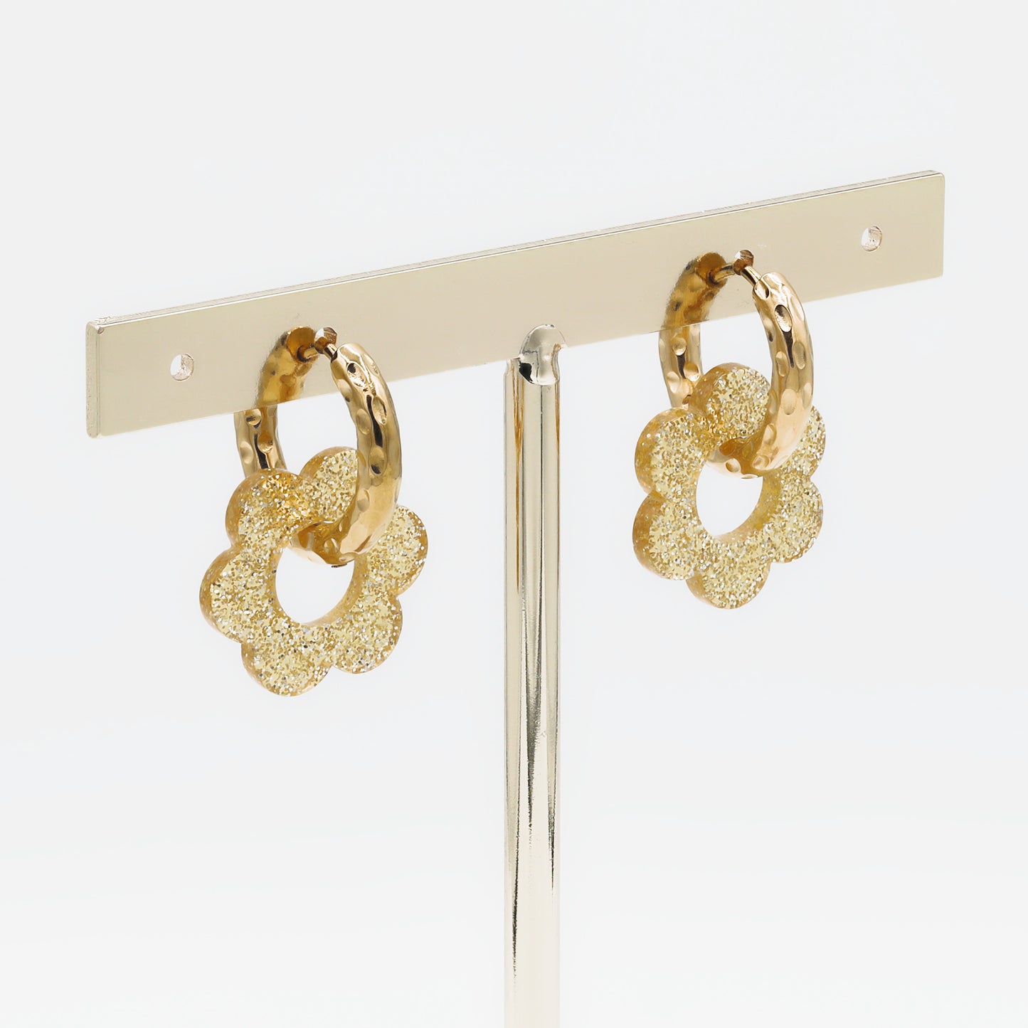 Créoles rondes effet martelé avec fleur transparente à paillettes